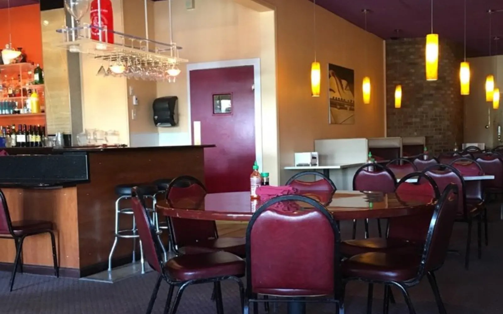 Warm and welcoming Wild Basil dining room