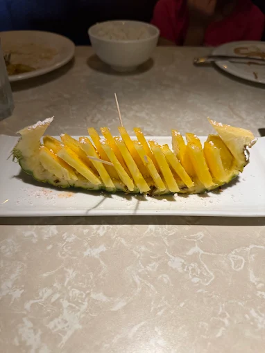Fresh pineapple served in a pineapple boat